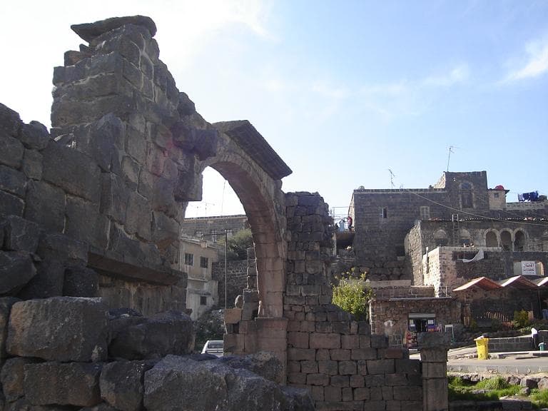 Ancient arch and basalt houses in as-Suwayda, Jabal al-Druse